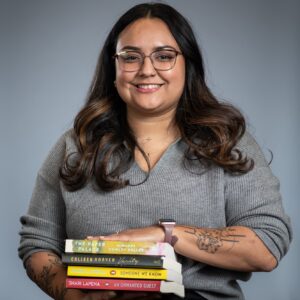 Jacqueline Longhurst holding books