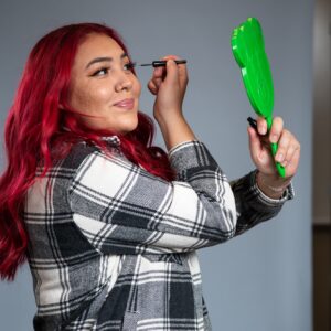 Jennifer Rodriquez-Vega doing make up