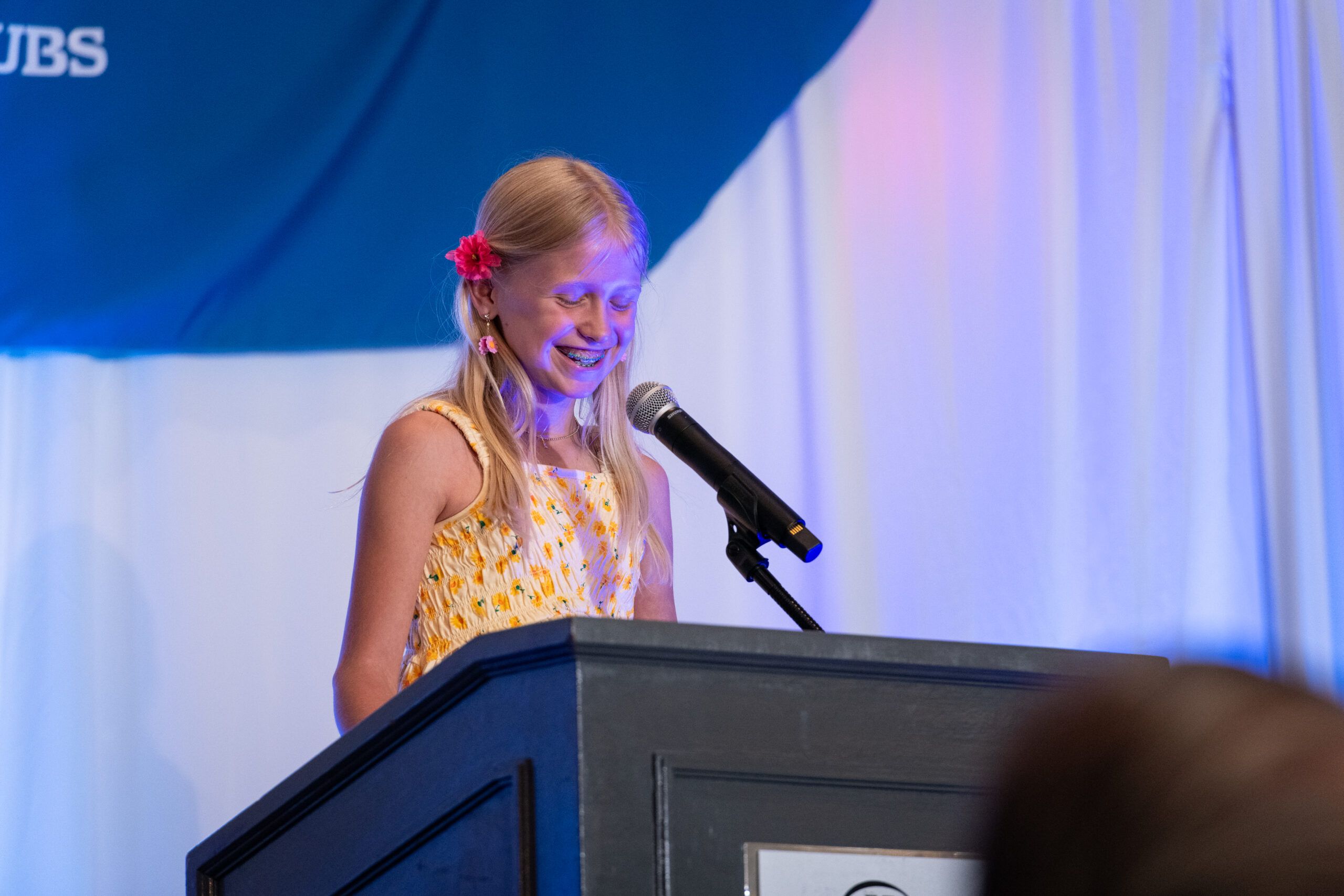 Camden giving speech at the 2025 spring soiree