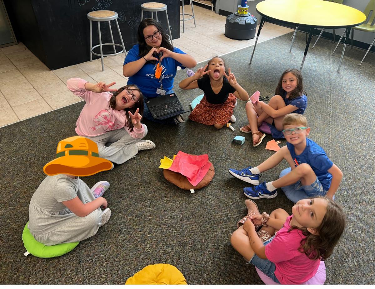 Photo of members making goofy faces for the picture.