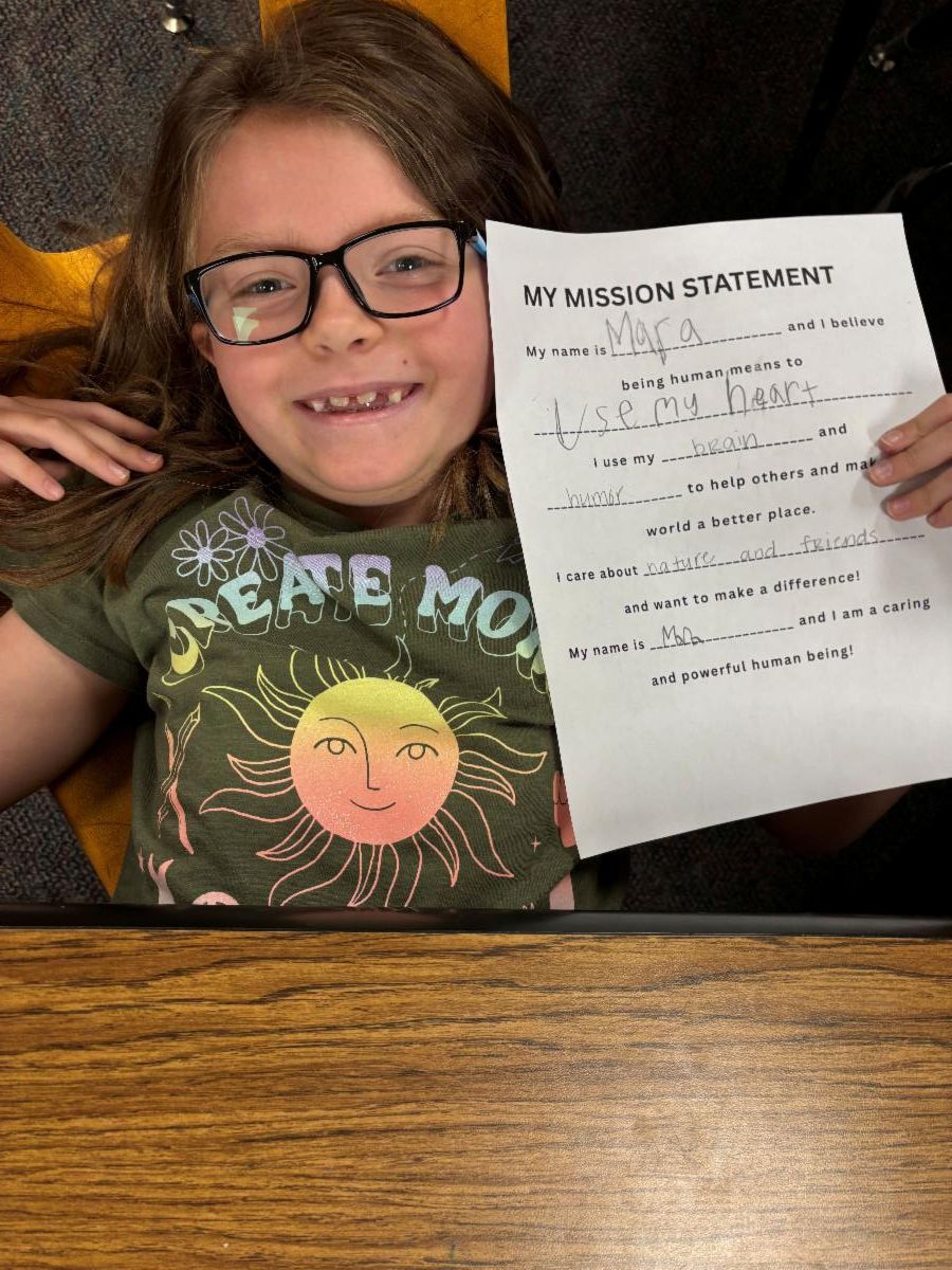 Photo of member with his mission statement.